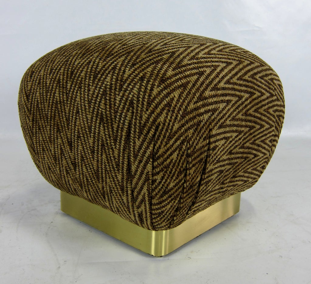 Stylish Pouf with Brass clad base, freshly reupholstered in a heavyweight herringbone pattern Chenille.