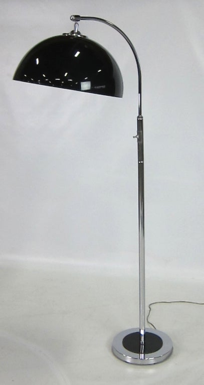 Chrome floor lamp with adjustable black Polycarbonate half-sphere shade.  Please browse our entire inventory at www.antiquesdumonde.1stdibs.com

Shade-16