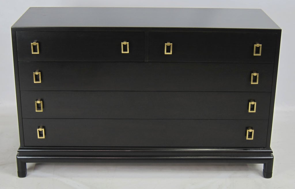 5 drawer dresser by Renzo Rutili for Johnson Furniture with Brass Drop-Ring pulls. Beautiful quality piece refinished in Ebony lacquer.  Please see our complete inventory at www.antiquesdumonde.1stdibs.com.