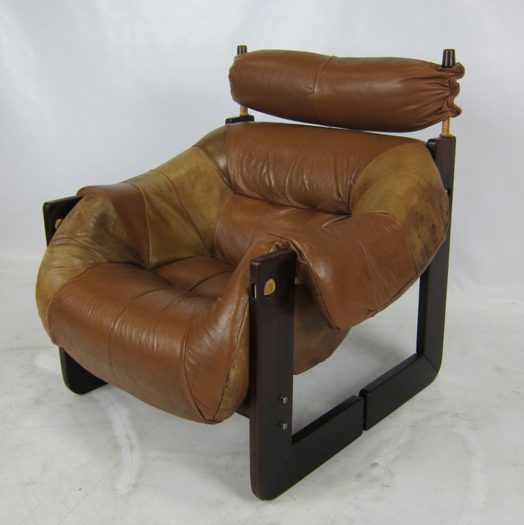 Rosewood Framed Lounge chair with beautifully patinated Leather seat by Percival Lafer.