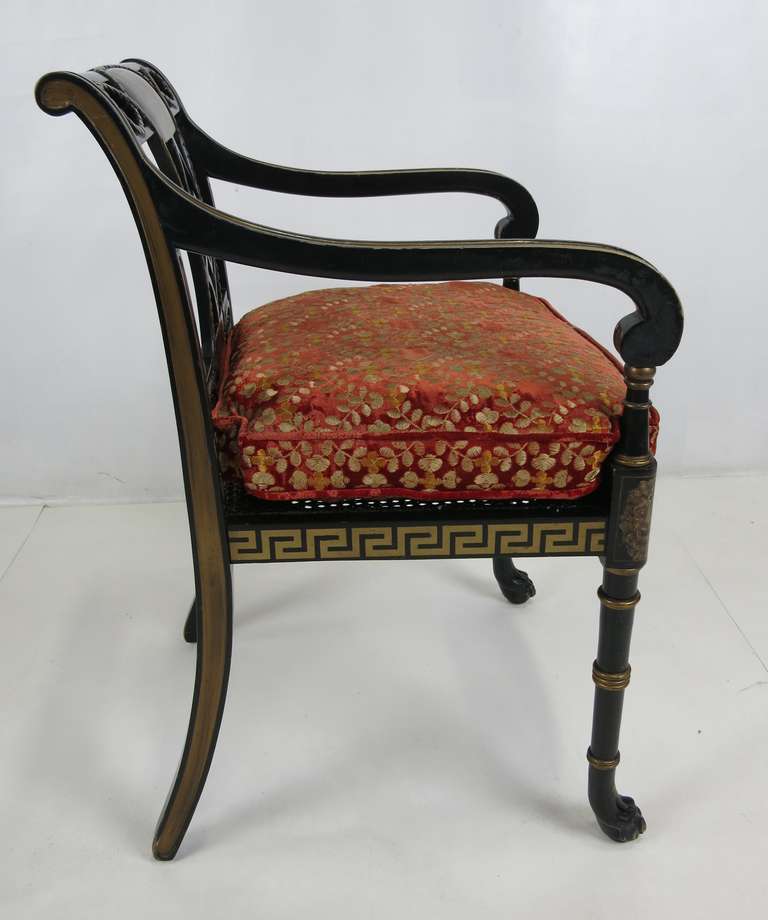 Cane Set of Four Regency Armchairs with Paw Feet
