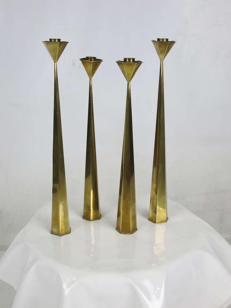 Set of four handcrafted Hexagonal Candlesticks of varying heights by Casa Castro Silversmiths of Tlaquepaque, Mexico.  Heights vary from 15.5 to 18