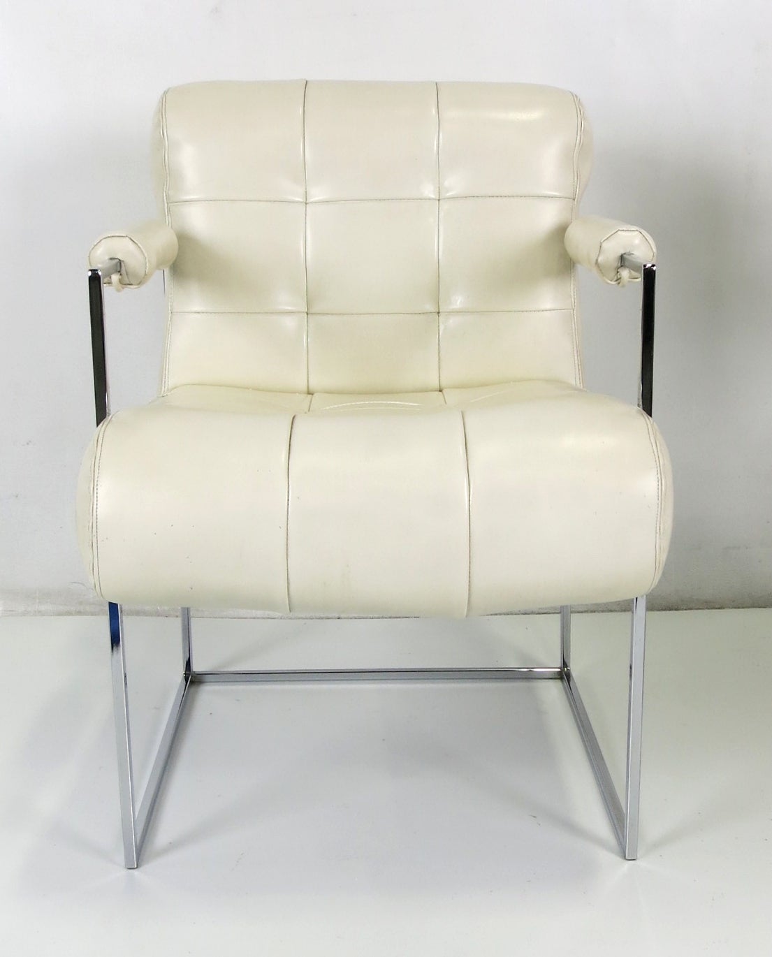 Pair of Classic lounge chairs or dining armchairs by Milo Baughman for Thayer Coggin in their original vinyl upholstery. The frames are in beautiful mint condition.