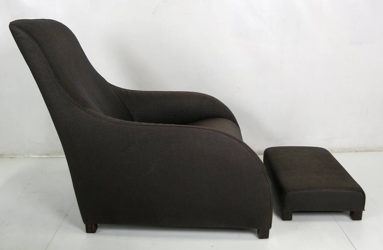 Pair of Classic Kalos lounge chairs with one ottoman by Antonio Citterio for B&B Italia/Maxalto. The pair feature dark grey oak legs and can be upholstered either as shown or skirted as in the last photo. They can also take new covers as provided by