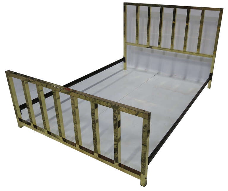 Queen Bed Frame with head and foot boards, along with support frame for box spring and mattress (frame crossbars not shown).  The frame is beautifully constructed of heavy square brass tubing.  The piece has been freshly polished and lacquered. 