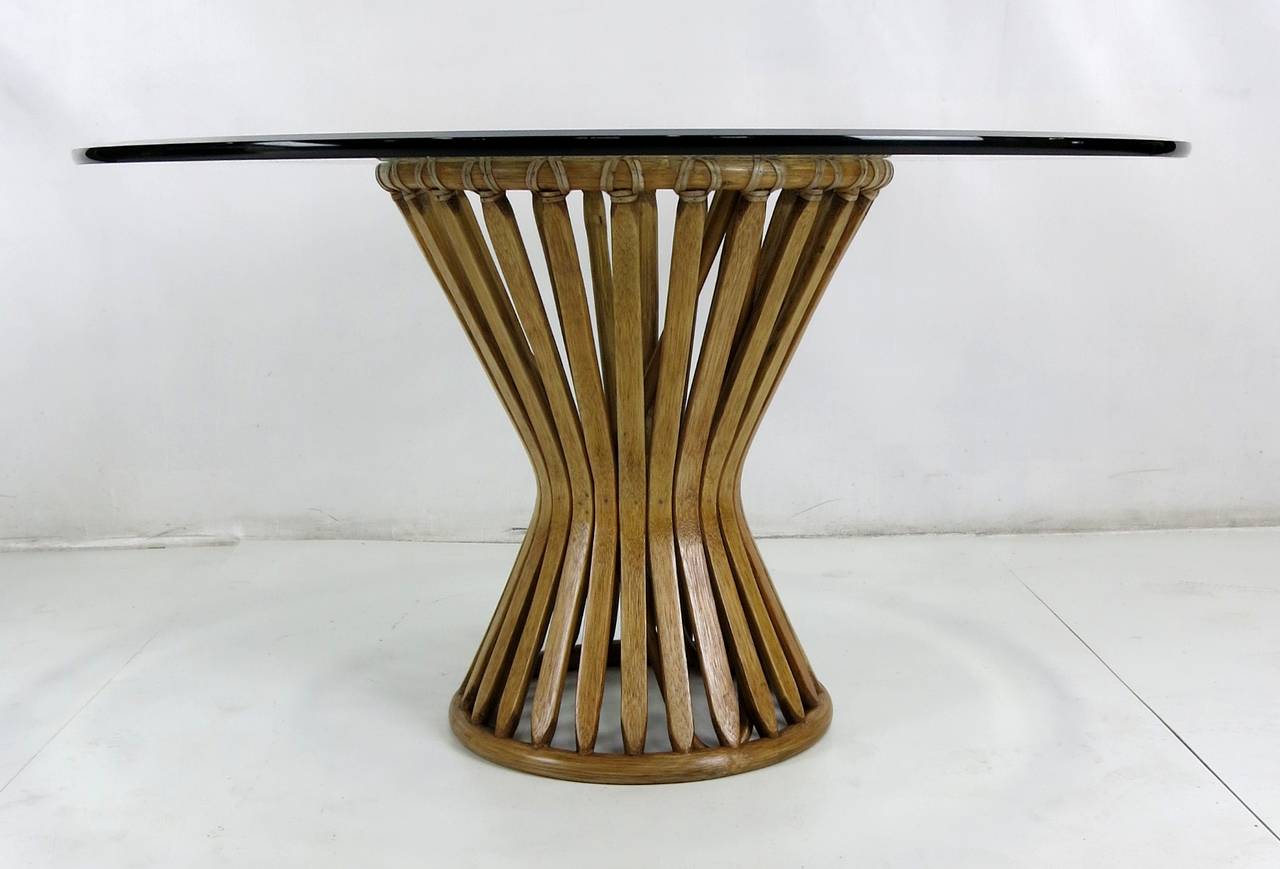 Oak, rattan and leather bound lounge or side table by John McGuire for McGuire Furniture. Would also work beautifully as a high coffee table with the appropriate top. The base has been completely restored and refinished in natural lacquer as