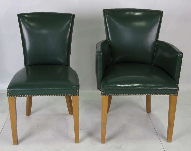 Set of six early Modern Dining Chairs by by the venerable Red Lion Furniture Co..  The set has been reupholstered in high quality green vinyl with nailhead trim.  Red Lion Furniture was one of the top makers of Modern furnishings in the 50's.