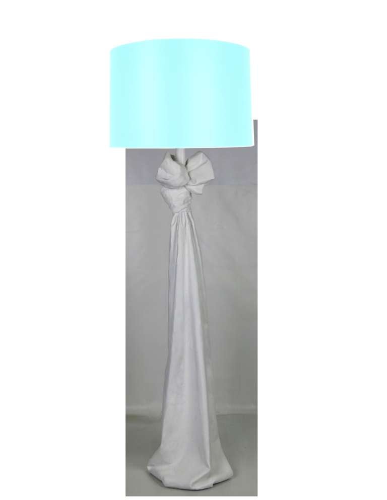 Plaster floor lamp in the form of a fabric drape tied in a bow at the top in the style of Dickinson.