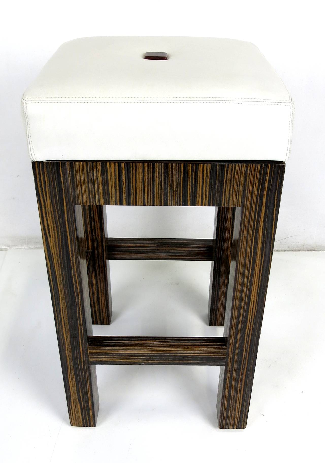 Set of Three Macassar Ebony Swiveling Bar Stools with Leather Seats