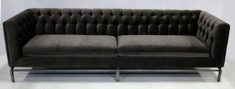 Spectacular Tufted Modern Chesterfield style sofa on a Gunmetal plated steel base with crossed members ala Kjaerholm by Stow Davis.  Please call or use the 