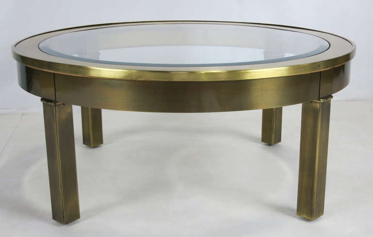 Chic Brass Coffee Table with inset beveled glass top by Mastercraft.