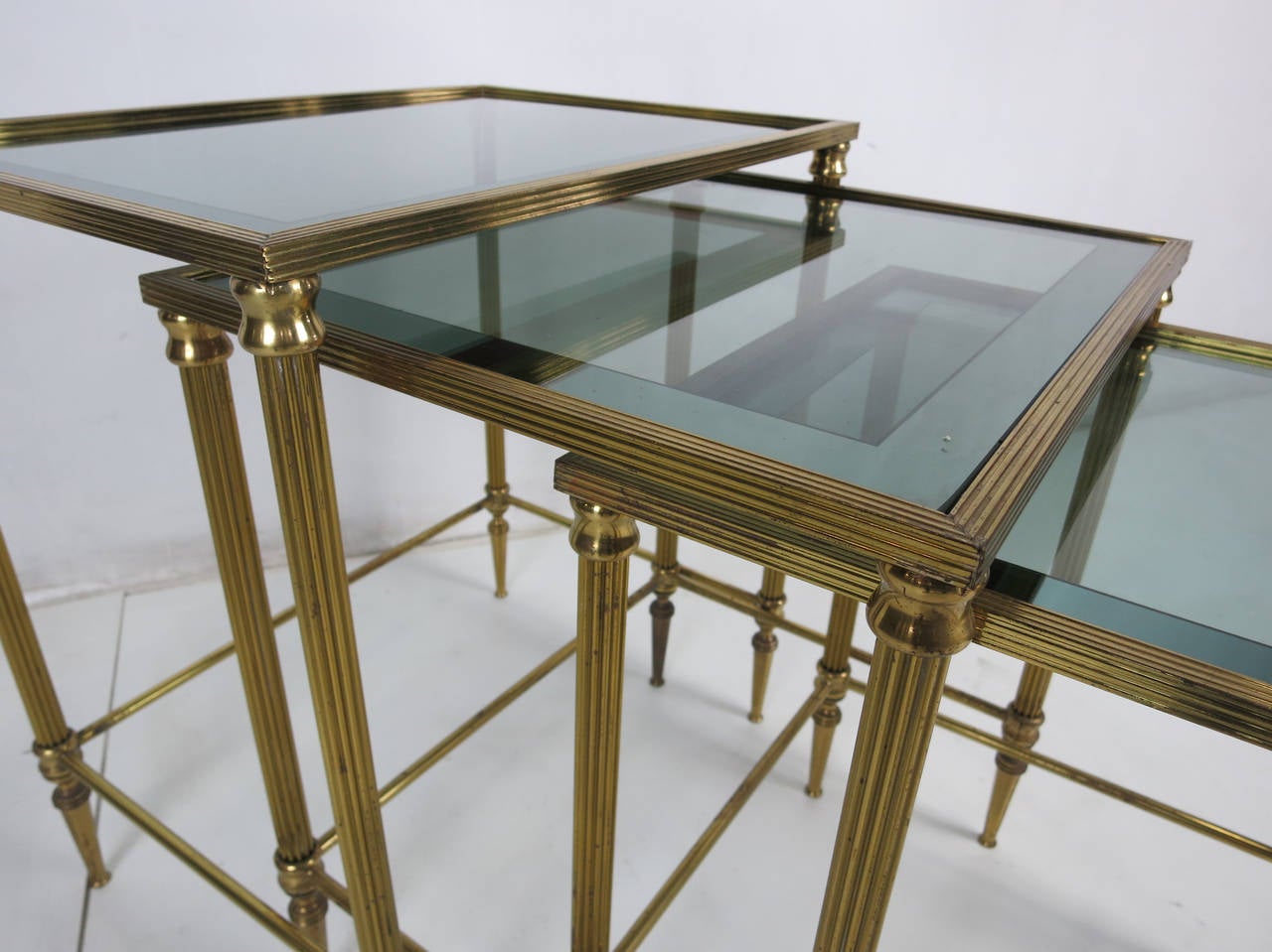 Set of Italian Brass Nesting Tables with Mirror Bordered Tops In Excellent Condition In Danville, CA