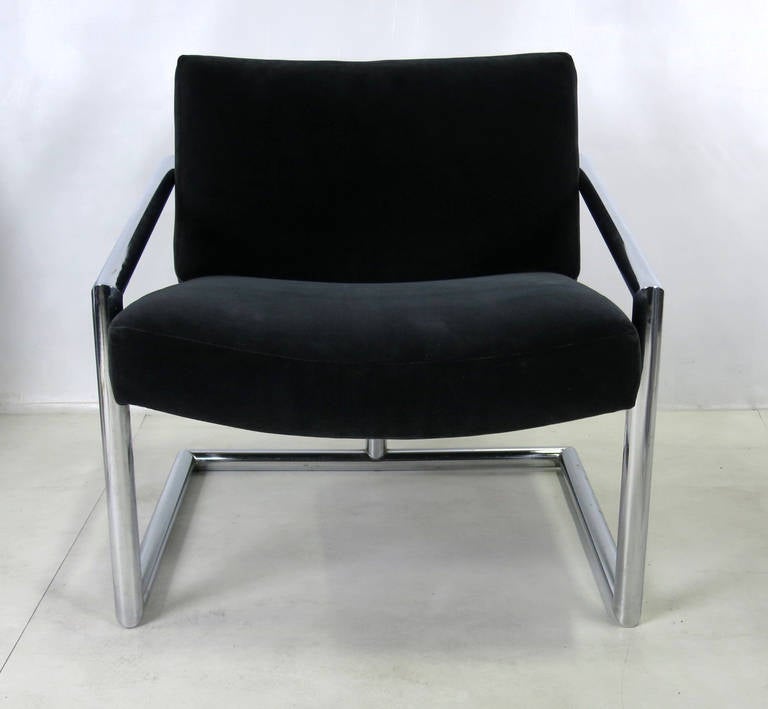 Rare pair of Lounge Chairs with thick tubular chrome frames.
