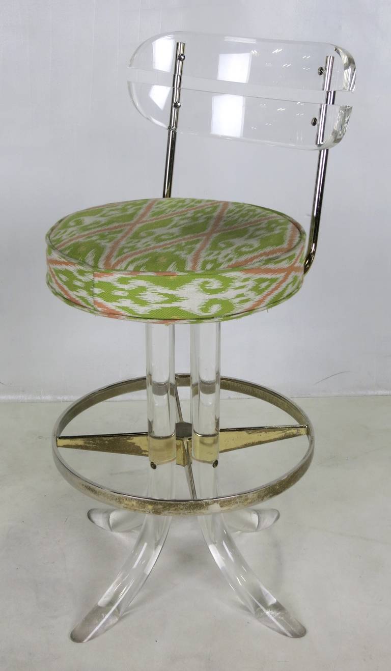 Fantastic Pair of Lucite counter height Barstools by Hill Manufacturing of New York.  The pair are in excellent condition.  All of the Lucite has been freshly polished and without any cracks or crazing.