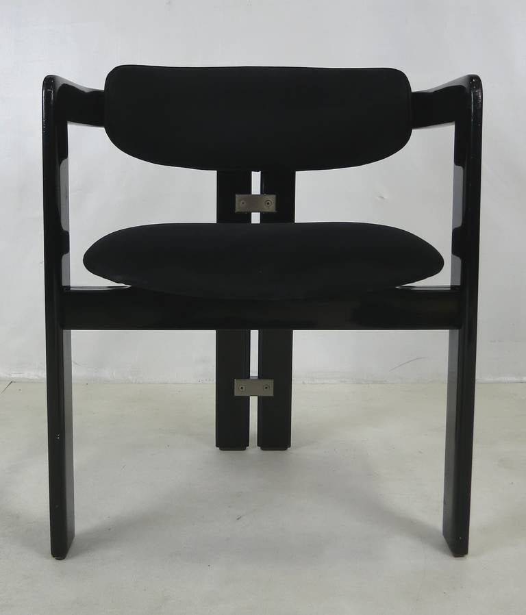 A lovely example of this Classic chair in black lacquer with suede upholstery. The chair has been refinished and is in excellent condition.