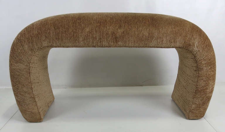 Upholstered Waterfall Bench that has been designed specifically for the end of a tall bed....it stands 24