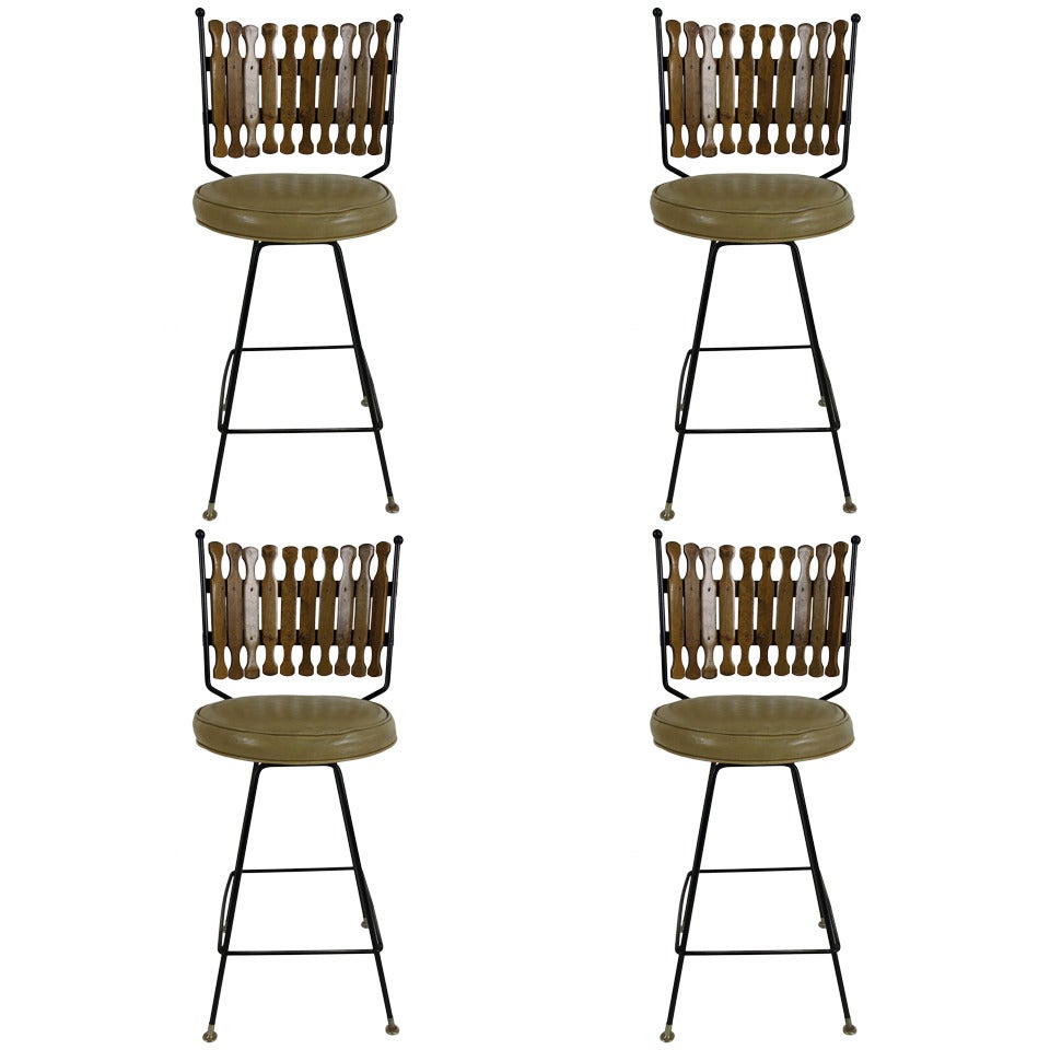 Set of Four Bar Stools in the style of Umanoff