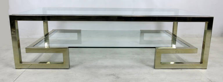Two level Greek key motif coffee table with brass-plated steel.