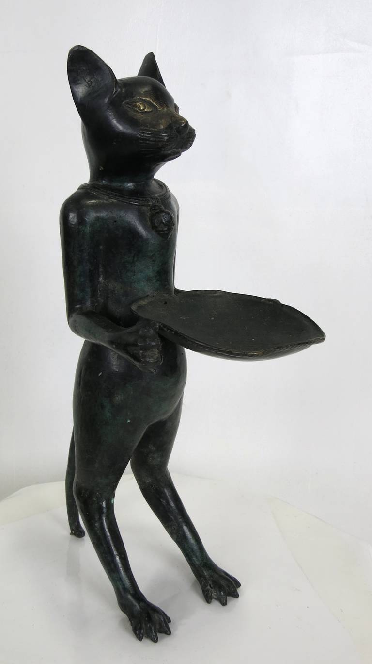 Large hollow cast bronze Le chat maître d'hotel in the style of Giacometti.
