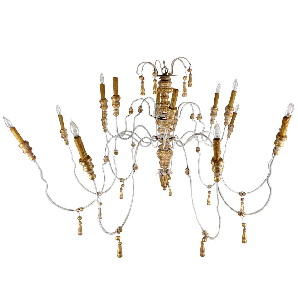 Huge Italian Iron and Carved Parcel Gilt Wood Chandelier