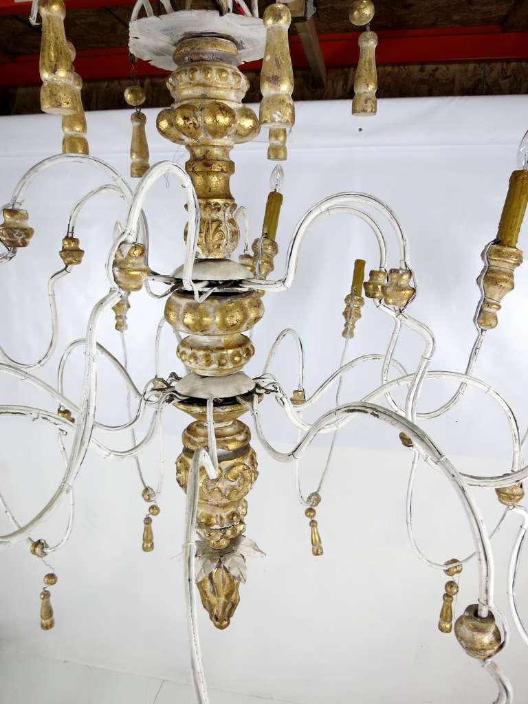 Metal Huge Italian Iron and Carved Parcel Gilt Wood Chandelier