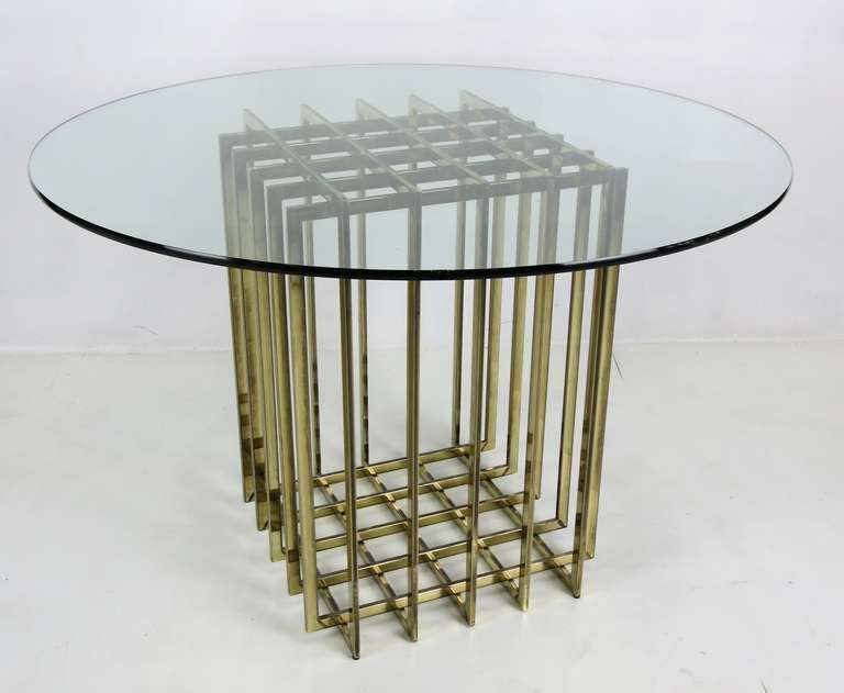 Cage Form Table Base by Pierre Cardin.  The hinge points swivel allowing the table to take many forms from square to oblique.  Presented in the photos with a 42