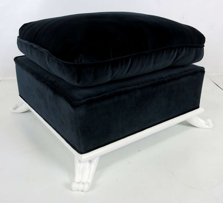 Luxurious stool upholstered in Midnight Blue Velvet on a carved wood base with wood scrolling feet.  Designed by Parish-Hadley in the 1960's.