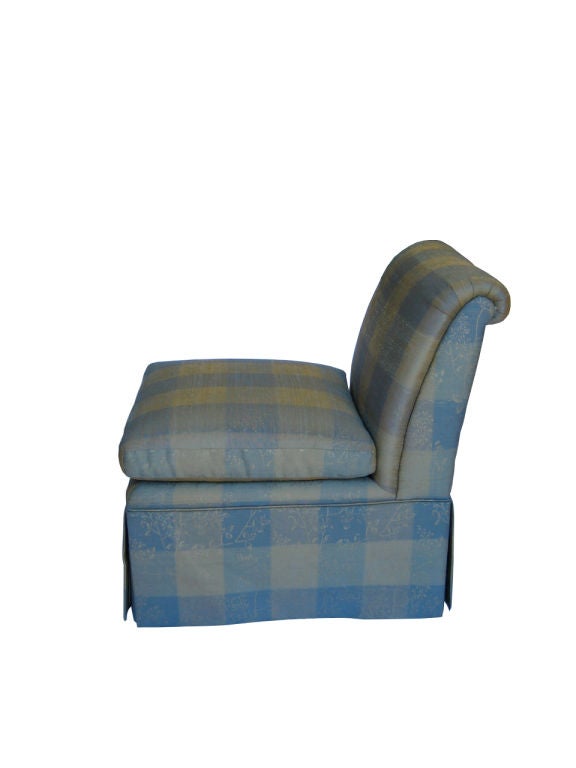 Pair of skirted skirted Slipper Chairs with loose cushion seat.