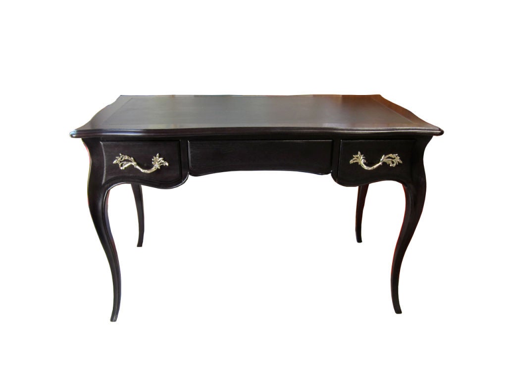 Louis XV style Writing Desk by Jacques Bodart, NY.  Freshly restored in Ebony lacquer with black leather writing surface.  Bronze pulls have been freshly polished and clear lacquered.