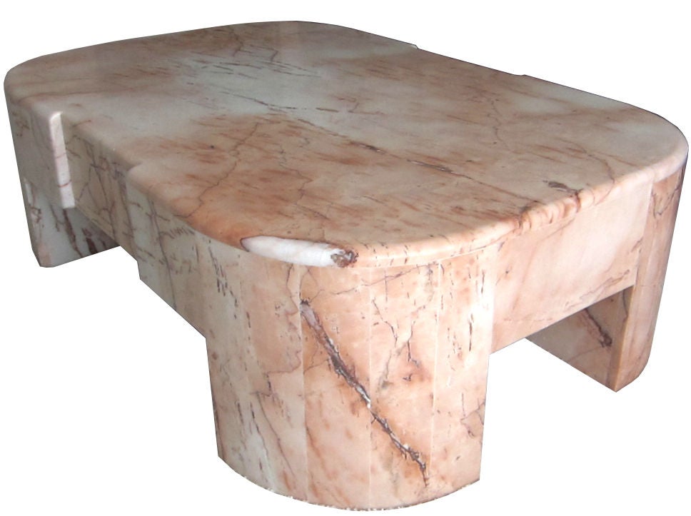 Massive Marble Radius Corner Coffee Table in the style of Karl Springer.