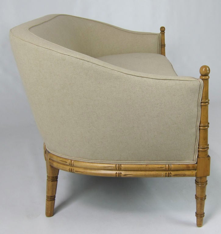 Elegant Regency style faux Bamboo framed Settee freshly refinished and reupholstered in Belgian Linen.