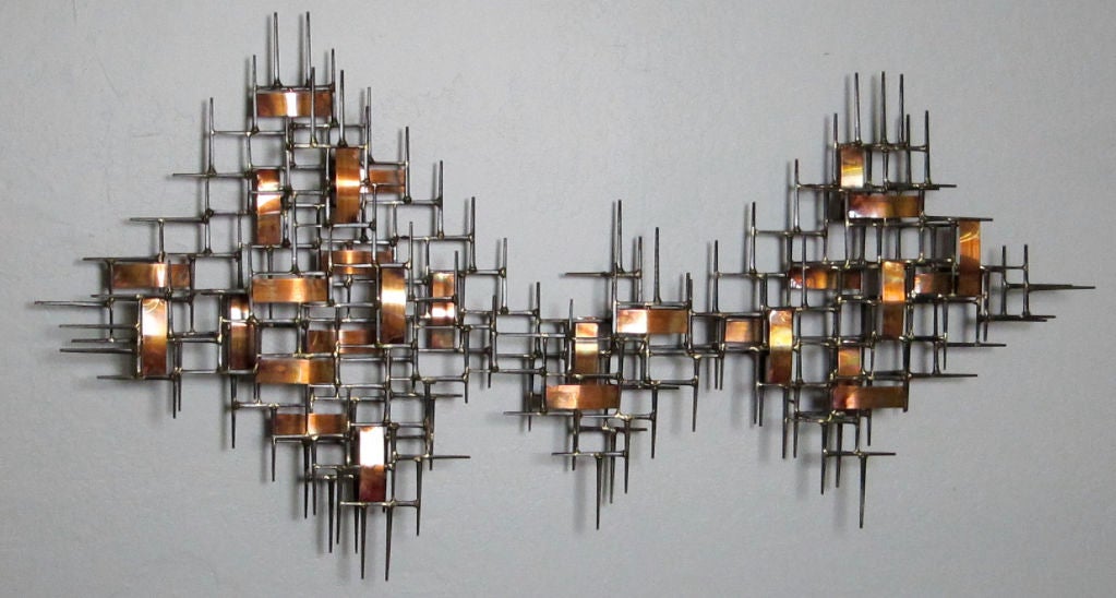 Beautifully crafted large three layer mixed Metal Brutal Modern Wall Sculpture constructed of Masonry nails brazed with Brass solder and patinated copper details.  Evocative of works by Bertoia, Fantoni, and Jere.
