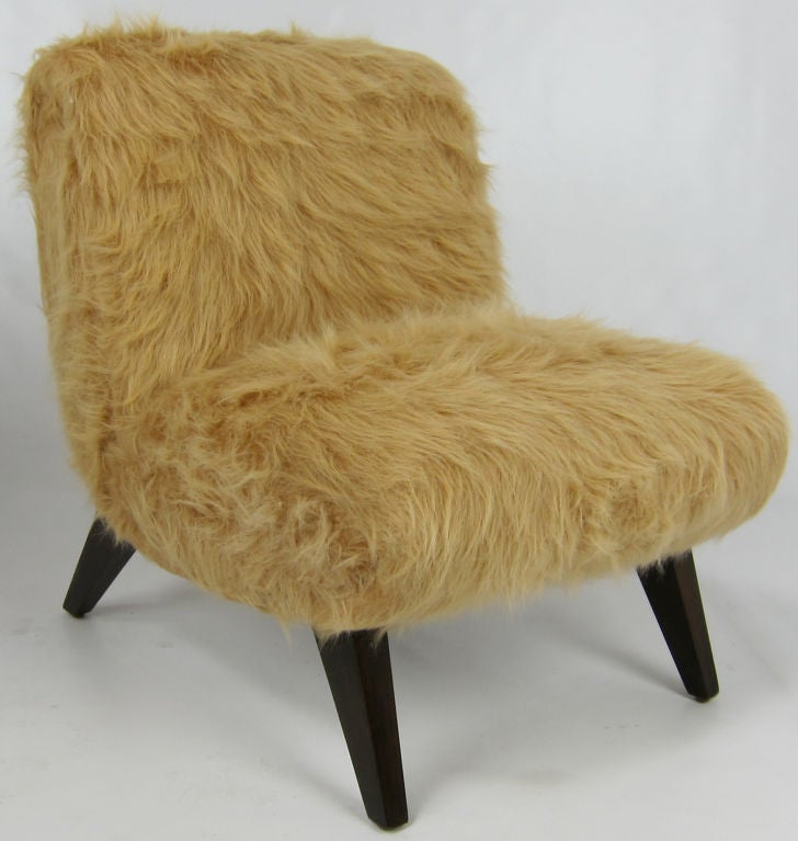 Slipper chair with splayed legs upholstered in elegant Faux Fur in the style of William Haines.