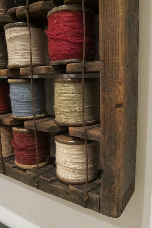 Industrial Monumental Wood Rack with Wool Yarn Bobbins