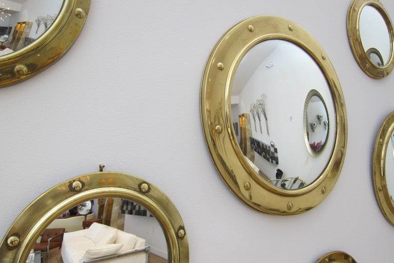  Grouping of 9, 1930`s through 1960`s English brass porthole convex mirrors. 
Great vintage patina.