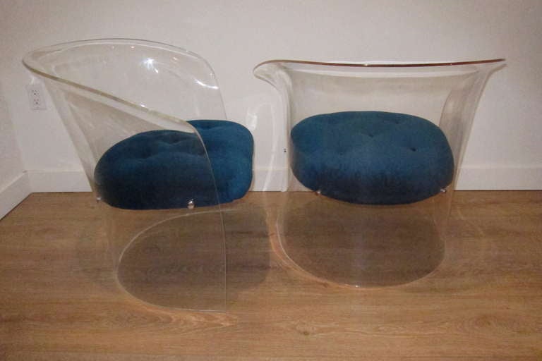 Great pair of lucite chairs. Newly upholstered with blue peacock Sunbrella velvet.

THIS ITEM IS LOCATED IN  MANHATTAN AT  1STDIBS@NYDC SHOWROOM. 
200 LEXINGTON AVE - 10TH FLOOR, NYC.