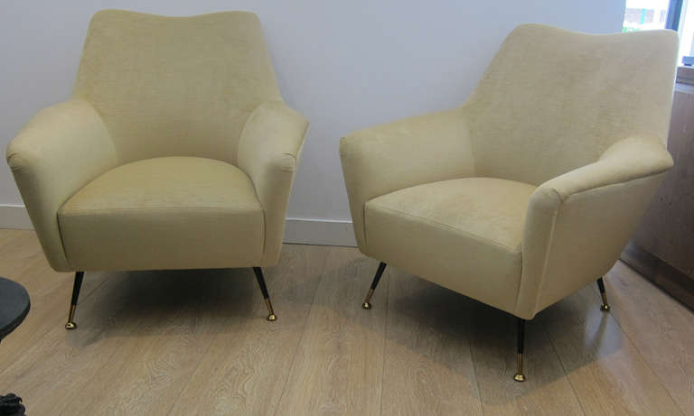 Amazing pair of  1950`s Italian armchairs. Newly upholstered with light brown velvet , black enamel and brass legs.