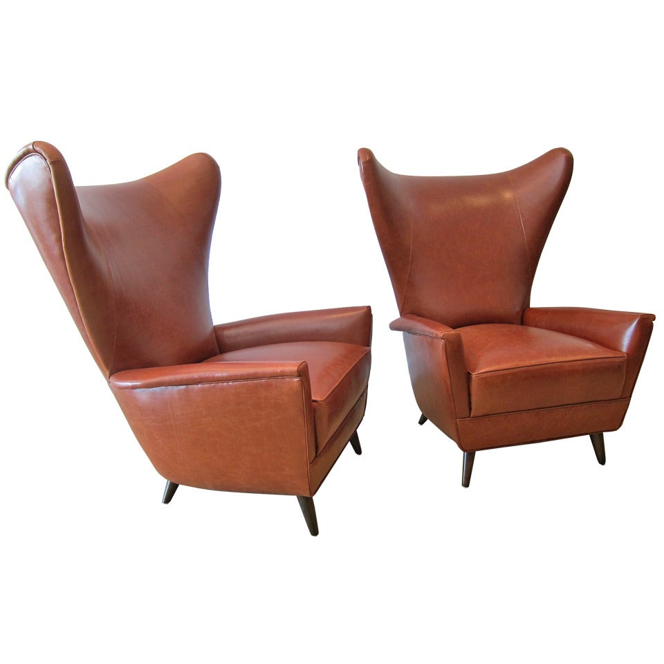 Pair of 1950's  Italian Wing Back Lounge Chairs.