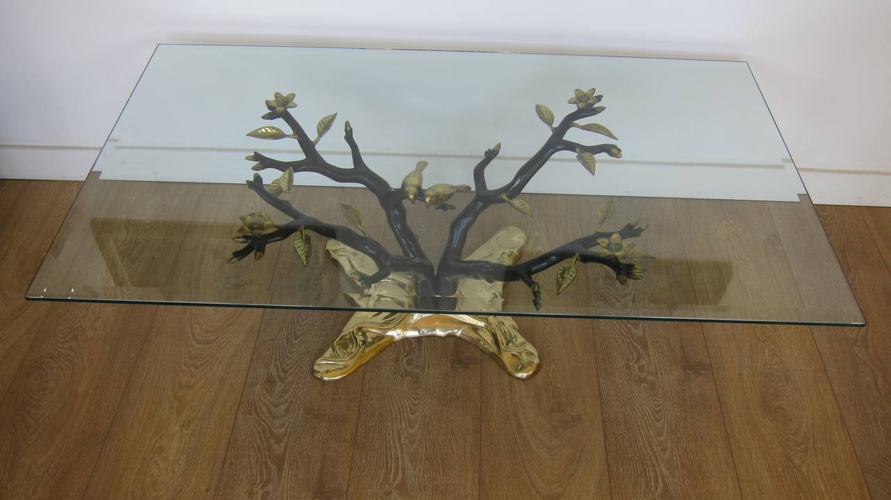 Cast bronze tree coffee table with dark bronze patina and polish brass patina.
30