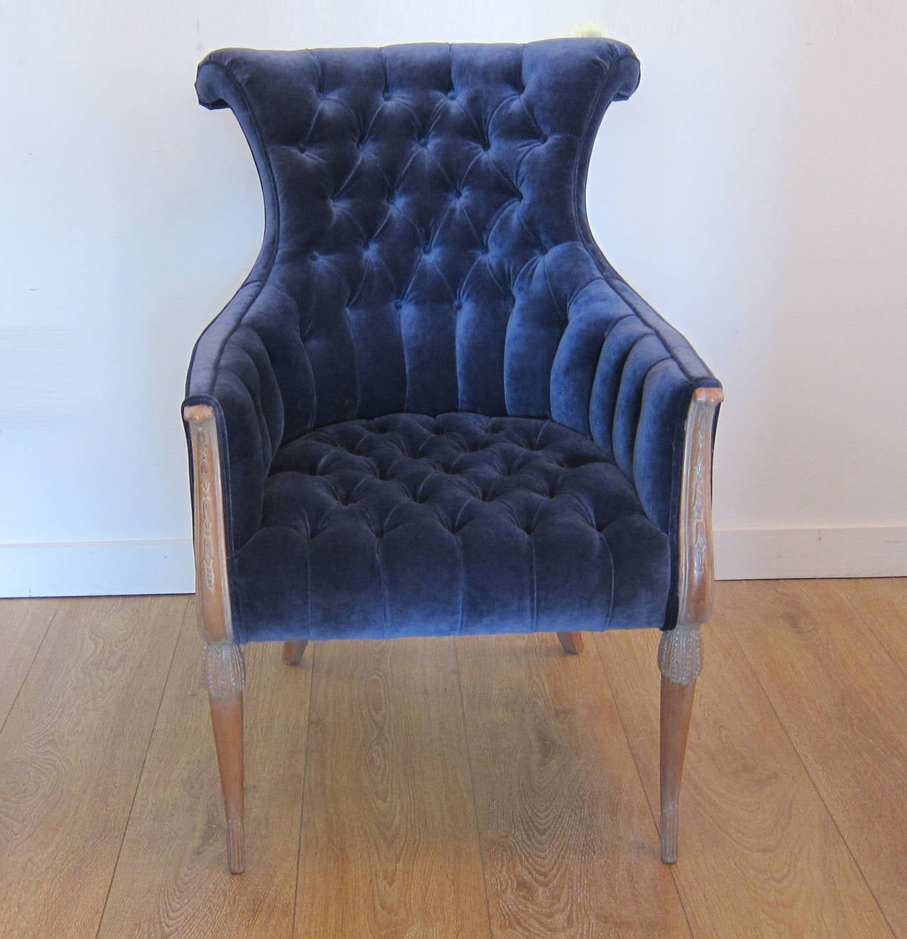 Pair of re scroll back armchairs or bergeres by Grosfeld House. Newly upholstered with blue velvet fabric and washed sycamore wood patina.