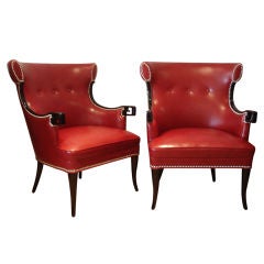 Vintage Pair of Leather Barrel Back Chairs.
