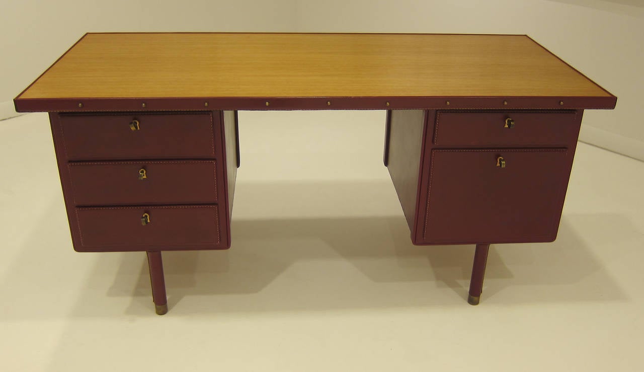 Mid-Century Modern Red Stitched Leather Desk by Jacques Adnet.