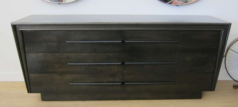 Sleek charcoal ebonized 6 drawer dresser, on a recessed base.
Newly restored to perfection.  Sweden circa 1950's.

THIS ITEM IS LOCATED IN MANHATTAN AT p1STDIBS@NYDC SHOWROOM. 
200 LEXINGTON AVE - 10TH FLOOR, NYC