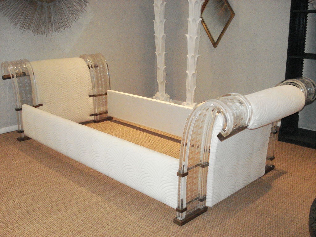 Beautiful twin size lucite bed/ daybed with bronze accents.  Newly upholstered. Could be perfectly used as a daybed.