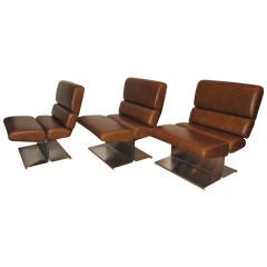 Retro Suite of Three French Lounge Chairs by Monnet.