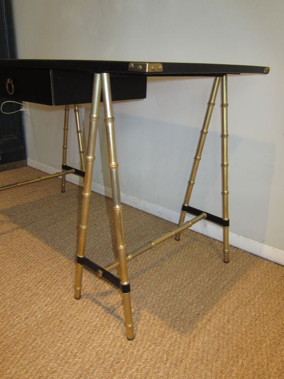 Campaign Desk by Jacques Adnet.