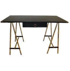 Campaign Desk by Jacques Adnet.