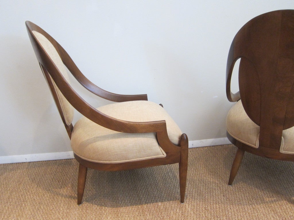 Elegant pair of spoon back lounge chairs, newly restored walnut frame and upholstered with silk linen. Great proportion.