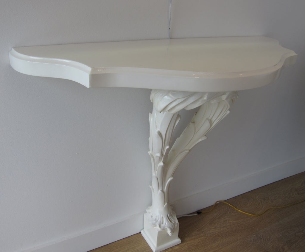 sculpted wood console after Serge Roche, white lacquer finish.