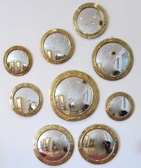 Vintage Brass Porthole Convex Mirrors Ensemble.